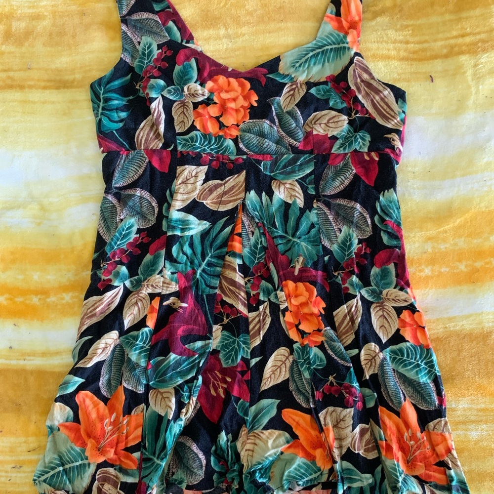 Floral Romper. Size Medium (M). Used.